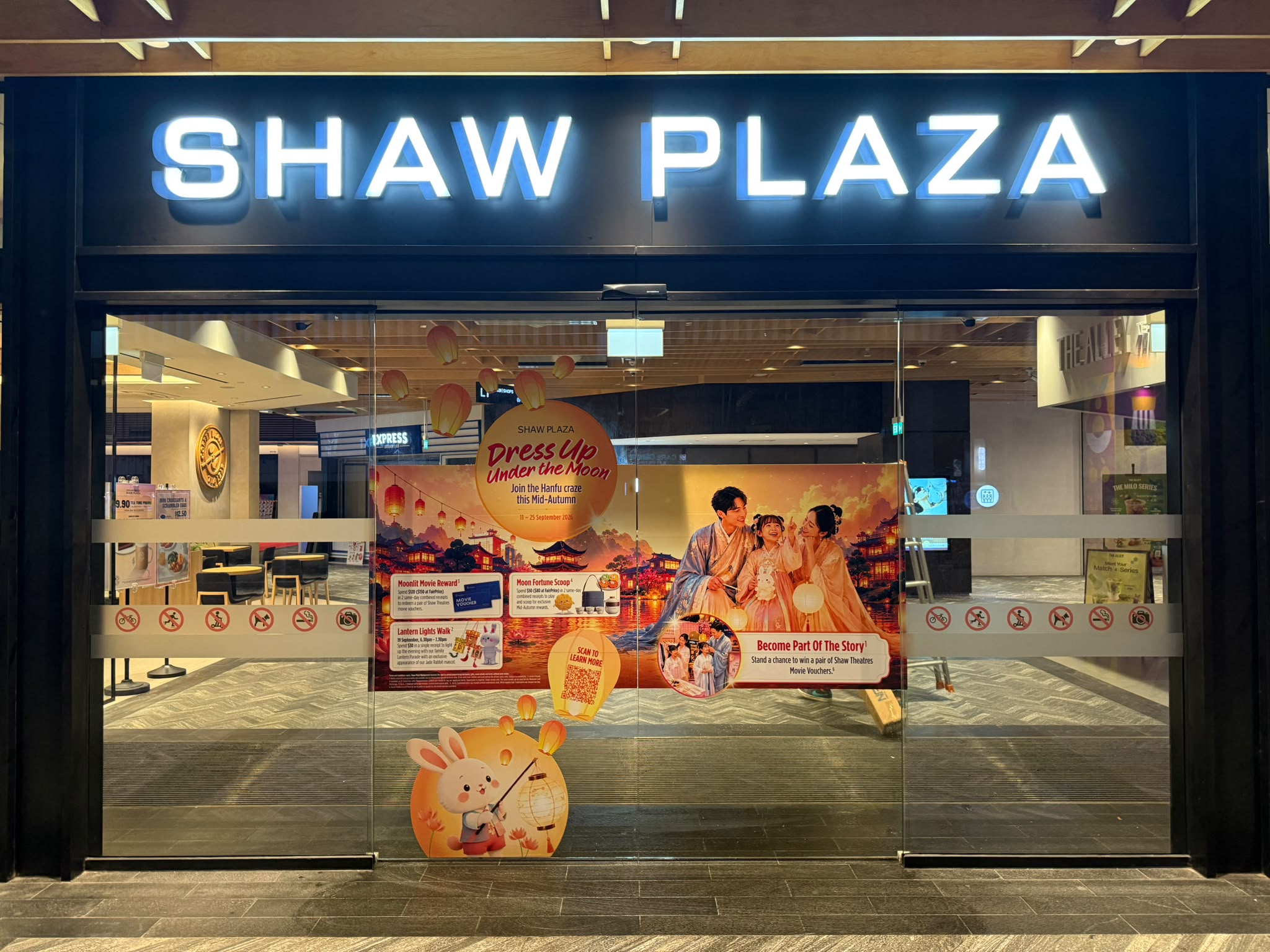 Shaw Plaza storefront graphics
